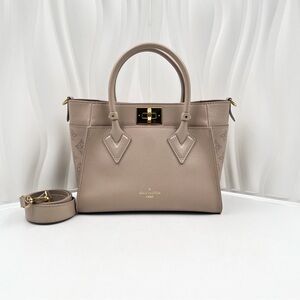 LOUIS VUITTON On My Side PM Bag Galet Mahina Leather with Monogram Perforation